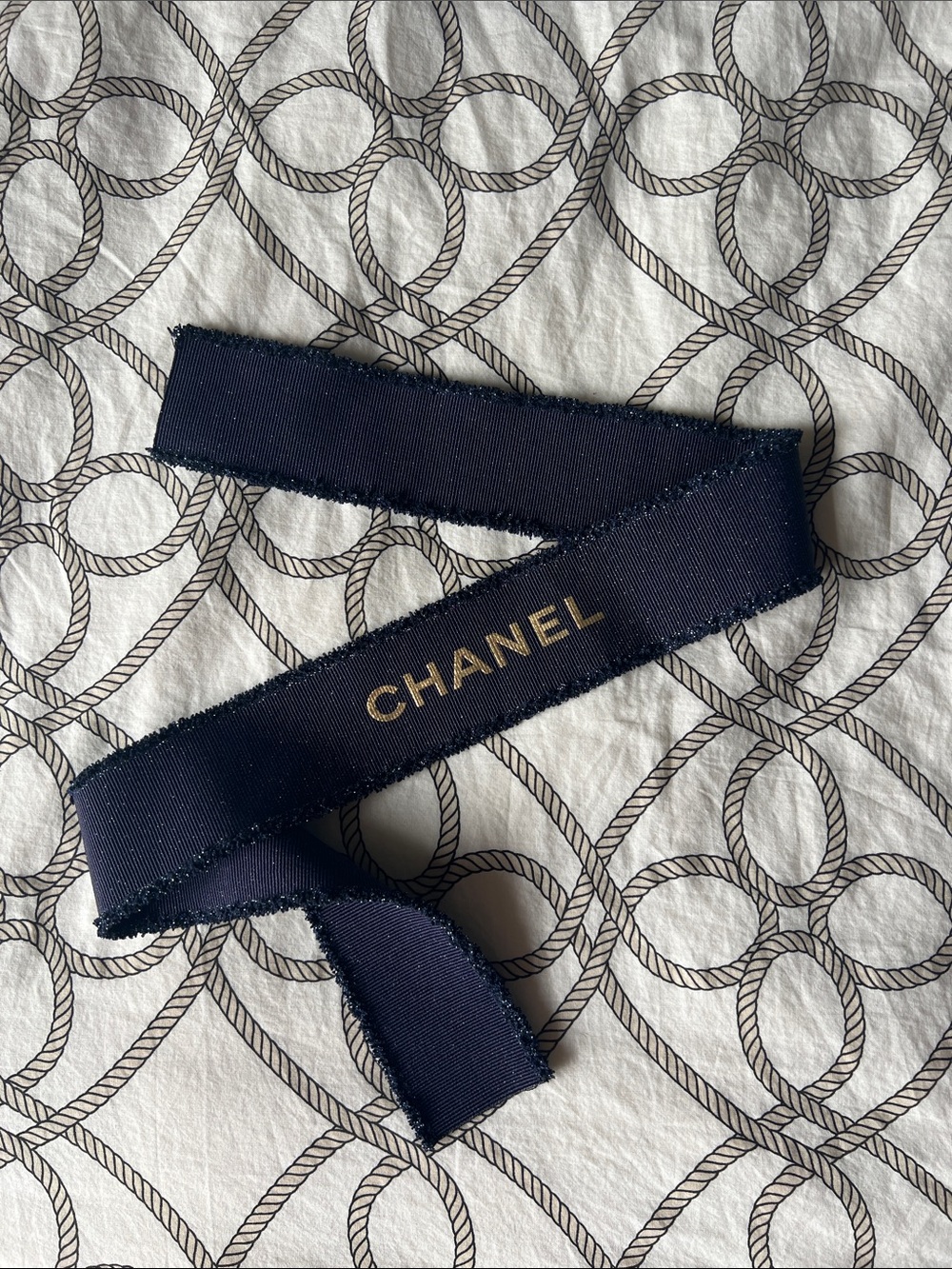 CHANEL Navy Ribbon with Gold Logo Print